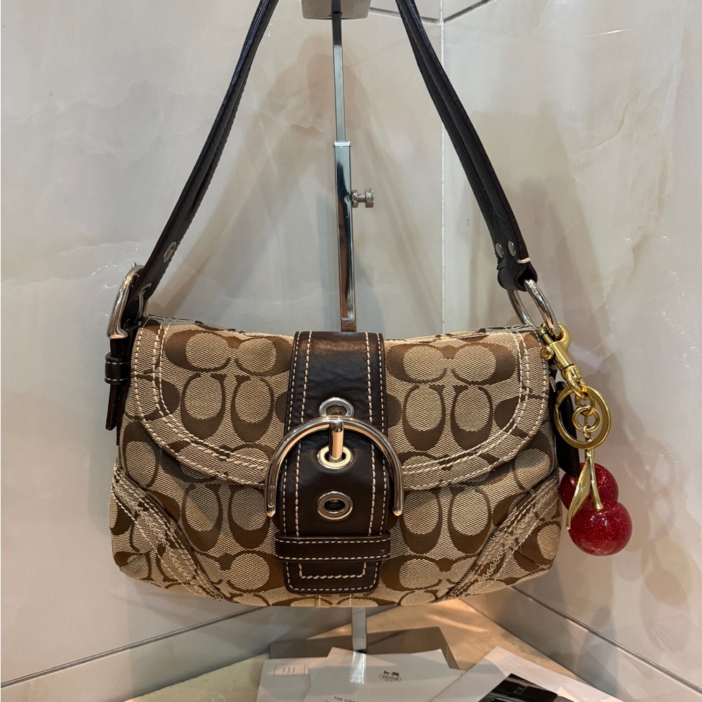 Coach Tan Signature Canvas Shoulder Bag with Red Cherry Charm